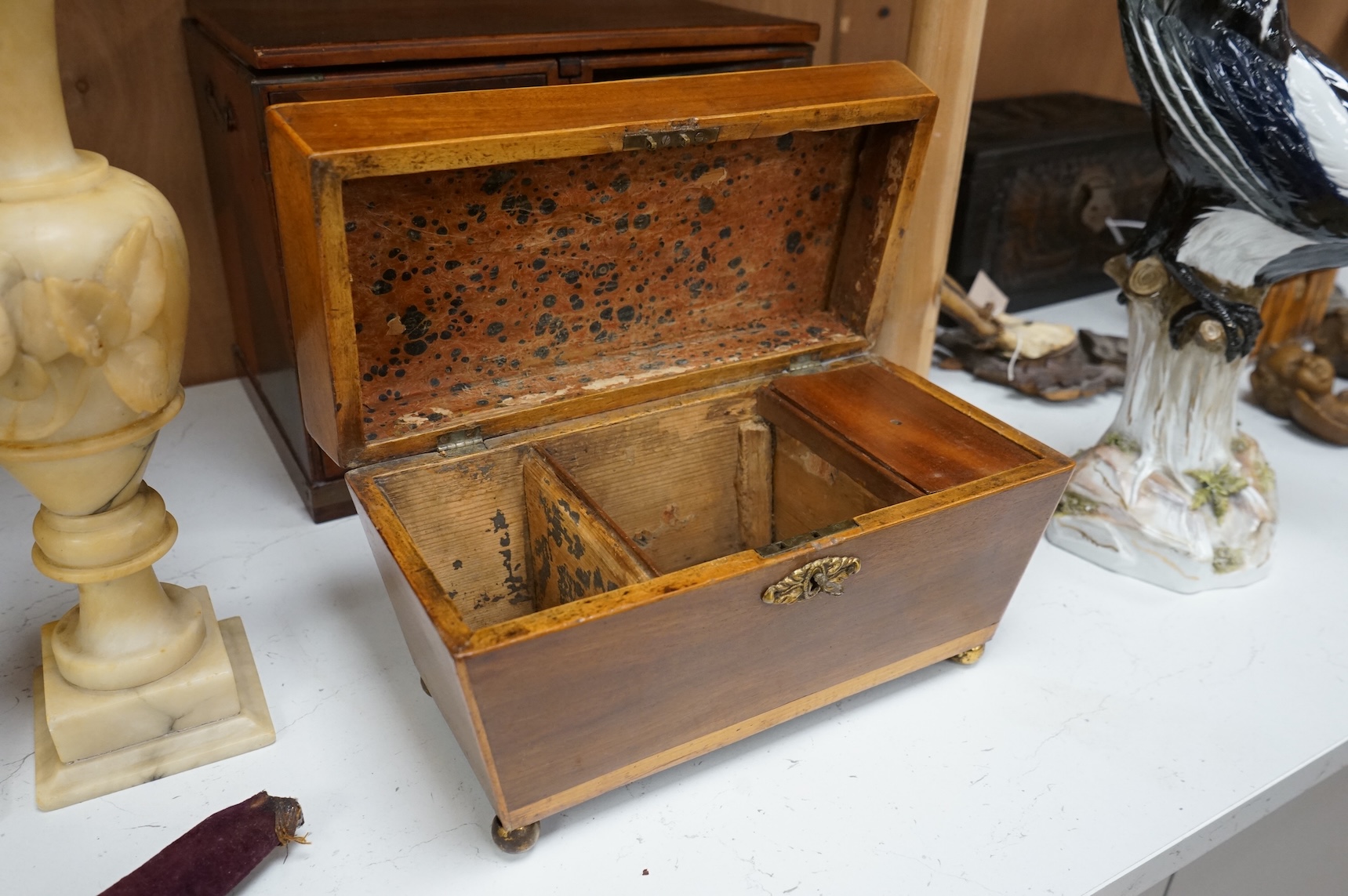 A Japanese parquetry table-top cabinet and a 19th century tea caddy, cabinet 33cm wide, 26cm high.